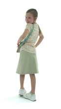 Load image into Gallery viewer, This Just Athletic Exercise Skirt for Girls Sizes, designed by Dressing For His Glory, is a must-have for the sweltering summer months. Crafted with high-performance sport fabric, it guarantees to keep you cool and dry, all while remaining incredibly durable and wrinkle-free.