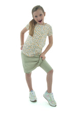 Load image into Gallery viewer, Athletic Exercise Skirt for Girls Sizes by Dressing For His Glory offers a perfect blend of modesty and comfort for girls. Its design allows for maximum movement while maintaining coverage. Ideal for sports and active lifestyles, this skirt provides both functionality and style. Bike shorts underneath are attached at the waistband.