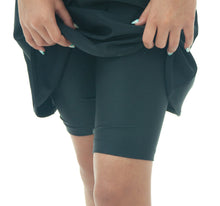 Load image into Gallery viewer, Swim Dress for Girls by Dressing For His Glory. Introduce your daughter to the Swim Dress, available in our Girls Sizes. Made with chlorine-resistant, UPF 50+ swimwear fabric, this dress is perfect for swimming and beach activities. Featuring a scooped neckline, cap sleeves, and a charming ruffle on the front yoke, the dress comes with attached bike shorts under the skirt for added comfort. Stay cool and stylish in this must-have piece.