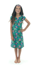 Load image into Gallery viewer, The Freestyle Swim Skirt is a high-performing swimwear option that combines style and functionality. Designed with a chlorine-resistant fabric that stretches and dries quickly, this skirt features attached bike shorts and an elastic waist for comfort and ease of movement.