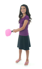 Load image into Gallery viewer, The Freestyle Swim Skirt is a high-performing swimwear option that combines style and functionality. Designed with a chlorine-resistant fabric that stretches and dries quickly, this skirt features attached bike shorts and an elastic waist for comfort and ease of movement.