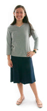 Load image into Gallery viewer, Knit Skort for Junior Sizes by Dressing For His Glory The Knit Skort is made with top quality anti-pill knit fabric and is extremely comfortable and it feels great to wear! The Flare Skort is a flare skirt, front and back, with loose fitting shorts underneath and it has a smooth elastic waist. The short are are 1" shorter than the skirt and are made in the same anti-pill knit fabric.