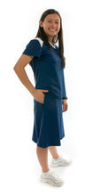 Load image into Gallery viewer, Athletic Exercise Skirt for Junior Sizes by Dressing For His Glory is perfect for all team sports is with performance sport fabric that keeps you dry. Bike shorts are attached to the waistband of the skirt and has an optional zipper pocket. The Athletic Exercise Skirt has a smooth flat elastic waistband. Great for any sport activity!