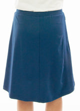 Load image into Gallery viewer, Athletic Exercise Skirt for Junior Sizes by Dressing For His Glory is perfect for all team sports is with performance sport fabric that keeps you dry. Bike shorts are attached to the waistband of the skirt and has an optional zipper pocket. The Athletic Exercise Skirt has a smooth flat elastic waistband. Great for any sport activity!