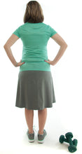 Load image into Gallery viewer, Athletic Exercise Skirt for Ladies Sizes by Dressing For His Glory is perfect for all team sports is with performance sport fabric that keeps you dry. Bike shorts are attached to the waistband of the skirt and has an optional zipper pocket. The Athletic Exercise Skirt has a smooth flat elastic waistband. Great for any sport activity!
