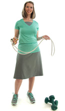 Load image into Gallery viewer, Athletic Exercise Skirt for Ladies Sizes by Dressing For His Glory is perfect for all team sports is with performance sport fabric that keeps you dry. Bike shorts are attached to the waistband of the skirt and has an optional zipper pocket. The Athletic Exercise Skirt has a smooth flat elastic waistband. Great for any sport activity!