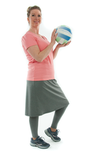 Load image into Gallery viewer, This Athletic Exercise Skirt by Dressing For His Glory is ideal for outdoor team sports, offering a durable performance sport fabric that wicks away moisture. Featuring attached long leggings with an optional zipper pocket, this skirt boasts a smooth flat elastic waistband, making it suitable for all winter sport activities.