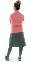 Load image into Gallery viewer, This Athletic Exercise Skirt by Dressing For His Glory is ideal for outdoor team sports, offering a durable performance sport fabric that wicks away moisture. Featuring attached long leggings with an optional zipper pocket, this skirt boasts a smooth flat elastic waistband, making it suitable for all winter sport activities.
