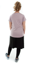 Load image into Gallery viewer, This Athletic Exercise Skirt by Dressing For His Glory is ideal for outdoor team sports, offering a durable performance sport fabric that wicks away moisture. Featuring attached long leggings with an optional zipper pocket, this skirt boasts a smooth flat elastic waistband, making it suitable for all winter sport activities.