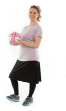 Load image into Gallery viewer, This Athletic Exercise Skirt by Dressing For His Glory is ideal for outdoor team sports, offering a durable performance sport fabric that wicks away moisture. Featuring attached long leggings with an optional zipper pocket, this skirt boasts a smooth flat elastic waistband, making it suitable for all winter sport activities.