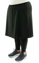 Load image into Gallery viewer, Athletic Exercise Skirt for Womens Plus Sizes by Dressing For His Glory is perfect for all outdoor team sports. It is made with performance sport fabric that keeps you dry. The long leggings are attached to the waistband of the skirt and has an optional zipper pocket. Perfect for winter sport activities.