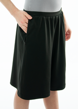 Load image into Gallery viewer, The Athletic Running Culotte is great for all team sports. It is made with performance sport fabric that keeps you dry and comfortable. You will really like the straight cut leg with enough fullness for modesty. It has an elastic waist and sporty stripes down the side seams (optional white stripes).