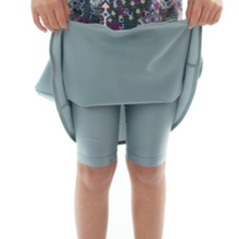 Load image into Gallery viewer, Freestyle Swim Skirt for Girls Sizes by Dressing For His Glory  Our Freestyle Swim Skirt is a great skirt to swim in. It is made in a chlorine resistant swimwear fabric that stretches with you and dries quickly! The skirt has bike short underneath and are attached at the elastic waist. The Freestyle Swim Skirt is great looking and keeps you cool and comfortable.