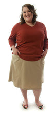 Load image into Gallery viewer, Flare Skort for Womens Plus Sizes by Dressing For His Glory The Flare Skort is a flare skirt with loose fitting shorts underneath that are attached at the waistband.  It has a flat front waist with an elastic waistband in the back and slit pockets on each side panel. The skirt has one optional off centered slit in the front and one in the back.