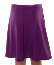 Load image into Gallery viewer, Freestyle Swim Skirt for Girls Sizes by Dressing For His Glory  Our Freestyle Swim Skirt is a great skirt to swim in. It is made in a chlorine resistant swimwear fabric that stretches with you and dries quickly! The skirt has bike short underneath and are attached at the elastic waist. The Freestyle Swim Skirt is great looking and keeps you cool and comfortable.