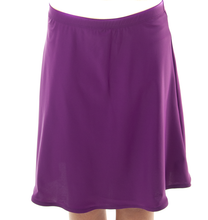 Load image into Gallery viewer, Freestyle Swim Skirt for Girls Sizes by Dressing For His Glory  Our Freestyle Swim Skirt is a great skirt to swim in. It is made in a chlorine resistant swimwear fabric that stretches with you and dries quickly! The skirt has bike short underneath and are attached at the elastic waist. The Freestyle Swim Skirt is great looking and keeps you cool and comfortable.