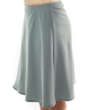 Load image into Gallery viewer, Freestyle Swim Skirt for Girls Sizes by Dressing For His Glory  Our Freestyle Swim Skirt is a great skirt to swim in. It is made in a chlorine resistant swimwear fabric that stretches with you and dries quickly! The skirt has bike short underneath and are attached at the elastic waist. The Freestyle Swim Skirt is great looking and keeps you cool and comfortable.