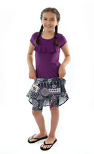 Load image into Gallery viewer, Freestyle Swim Skirt for Girls Sizes by Dressing For His Glory  Our Freestyle Swim Skirt is a great skirt to swim in. It is made in a chlorine resistant swimwear fabric that stretches with you and dries quickly! The skirt has bike short underneath and are attached at the elastic waist. The Freestyle Swim Skirt is great looking and keeps you cool and comfortable.