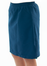 Load image into Gallery viewer, Girls Swim Straight Skort by Dressing For His Glory. Looking for a stylish and functional option for your little girl's swimwear? Our Swim Straight Skort is the perfect choice. Made with the highest-quality fabric, this skort offers a sleek look while also providing comfort and functionality. Your daughter will love wearing this skort to the beach or pool!