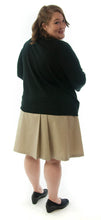 Load image into Gallery viewer, The School Uniform Skirt for Women's Plus Sizes by Dressing For His Glory has two off centered pleats in the front and back. It has a single button front closure with a small pocket. The skirt has a contour waistband and is comfortable, extremely durable, stain resistant, and great looking the entire school year!