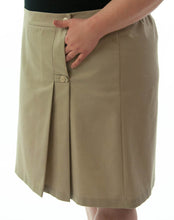 Load image into Gallery viewer, The School Uniform Skirt for Women's Plus Sizes by Dressing For His Glory has two off centered pleats in the front and back. It has a single button front closure with a small pocket. The skirt has a contour waistband and is comfortable, extremely durable, stain resistant, and great looking the entire school year!