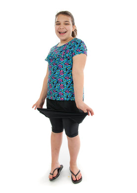 Freestyle Swim Skirt for Girls Plus Sizes by Dressing For His Glory  Our Freestyle Swim Skirt is a great skirt to swim in. It is made in a chlorine resistant swimwear fabric that stretches with you and dries quickly! The skirt has bike short underneath and are attached at the elastic waist. The Freestyle Swim Skirt is great looking and keeps you cool and comfortable.