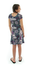 Load image into Gallery viewer, Swim Dress for Girls by Dressing For His Glory  Your daughter will absolutely love the Swim Dress in our Girls Sizes. It is made in chlorine resistant, fast drying swimwear fabric that is rated UPF 50+. Your daughter can just step into it from the neck and will feel free to swim or do those cartwheels on the beach!