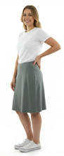 Load image into Gallery viewer, Athletic Exercise Skirt by Dressing For His Glory has an invisible zipper pocket - a great place to slip phone in to.