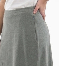 Load image into Gallery viewer, Dressing For His Glory grey athletic skirt with zippered pocket and flat elastic waistband, made of polyester and spandex.