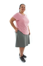 Load image into Gallery viewer, Athletic Exercise Skirt for Womens Plus Sizes by Dressing For His Glory  Athletic Exercise Skirt for Womens Plus Sizes by Dressing For His Glory is perfect for all team sports. It is made with performance sport fabric that keeps you dry. Bike shorts are attached to the waistband of the skirt and has an optional zipper pocket. The Athletic Exercise Skirt has a smooth flat elastic waistband and is great for any sport activity!