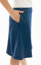 Load image into Gallery viewer, Athletic Exercise Skirt for Junior Sizes by Dressing For His Glory is perfect for all team sports is with performance sport fabric that keeps you dry. Bike shorts are attached to the waistband of the skirt and has an optional zipper pocket. The Athletic Exercise Skirt has a smooth flat elastic waistband. Great for any sport activity!
