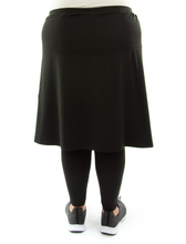 Load image into Gallery viewer, Athletic Exercise Skirt for Womens Plus Sizes by Dressing For His Glory is perfect for all outdoor team sports. It is made with performance sport fabric that keeps you dry. The long leggings are attached to the waistband of the skirt and has an optional zipper pocket. Perfect for winter sport activities.