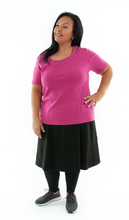 Load image into Gallery viewer, Athletic Exercise Skirt for Womens Plus Sizes by Dressing For His Glory is perfect for all outdoor team sports. It is made with performance sport fabric that keeps you dry. The long leggings are attached to the waistband of the skirt and has an optional zipper pocket. Perfect for winter sport activities.