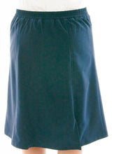 Load image into Gallery viewer, Flare Skort for Junior Sizes by Dressing For His Glory The Flare Skort is a flare skirt with loose fitting shorts underneath that are attached at the waistband.  It has a flat front waist with an elastic waistband in the back and slit pockets on each side panel. The skirt has one optional off centered slit in the front and one in the back.    The skirt and shorts are made in the same fabric with the shorts being 1&quot; shorter than the skirt.