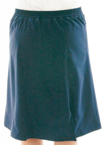Flare Skort for Junior Sizes by Dressing For His Glory The Flare Skort is a flare skirt with loose fitting shorts underneath that are attached at the waistband.  It has a flat front waist with an elastic waistband in the back and slit pockets on each side panel. The skirt has one optional off centered slit in the front and one in the back.    The skirt and shorts are made in the same fabric with the shorts being 1" shorter than the skirt.