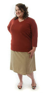 Flare Skort for Womens Plus Sizes by Dressing For His Glory The Flare Skort is a flare skirt with loose fitting shorts underneath that are attached at the waistband.  It has a flat front waist with an elastic waistband in the back and slit pockets on each side panel. The skirt has one optional off centered slit in the front and one in the back. 