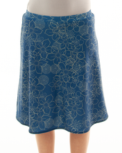 Load image into Gallery viewer, Freestyle Swim Skirt for Junior Sizes by Dressing For His Glory  Our Freestyle Swim Skirt is a great skirt to swim in. It is made in a chlorine resistant swimwear fabric that stretches with you and dries quickly! The skirt has bike short underneath and are attached at the elastic waist. The Freestyle Swim Skirt is great looking and keeps you cool and comfortable.