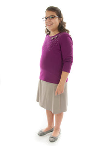 Knit Skort for Girls Plus Size by Dressing For His Glory The Knit Skort is made with top quality anti-pill knit fabric and is extremely comfortable!  It is a flare skirt, front and back, with loose fitting shorts underneath and it has a smooth elastic waist. The short are are 1" shorter than the skirt and are made in the same anti-pill knit fabric.