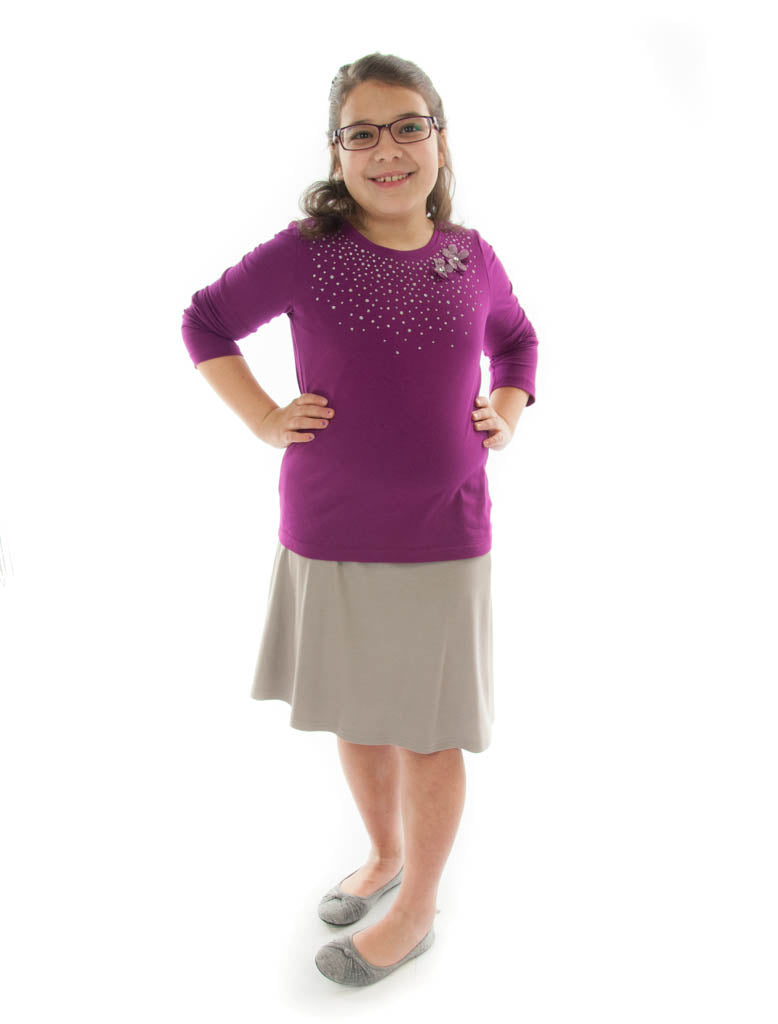 Knit Skort for Girls Plus Size by Dressing For His Glory The Knit Skort is made with top quality anti-pill knit fabric and is extremely comfortable!  It is a flare skirt, front and back, with loose fitting shorts underneath and it has a smooth elastic waist. The short are are 1