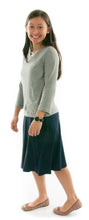 Load image into Gallery viewer, Knit Skort for Junior Sizes by Dressing For His Glory The Knit Skort is made with top quality anti-pill knit fabric and is extremely comfortable and it feels great to wear! The Flare Skort is a flare skirt, front and back, with loose fitting shorts underneath and it has a smooth elastic waist. The short are are 1&quot; shorter than the skirt and are made in the same anti-pill knit fabric. 