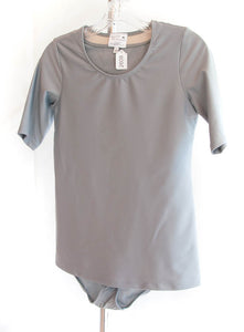 #2608 Sale Rack Item / Swim Body Tee / Junior Small / Gray by Dressing For His Glory is made with fast drying swimwear fabric- chlorine resistant- 2 layers of coverage - under layer snaps closed between legs- lined outer layer bodice-scooped elastic neck- longer sleeves-; very comfortable- cool and feminine - UPF 50