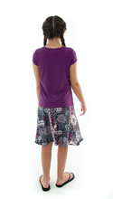 Load image into Gallery viewer, Freestyle Swim Skirt for Girls Sizes by Dressing For His Glory  Our Freestyle Swim Skirt is a great skirt to swim in. It is made in a chlorine resistant swimwear fabric that stretches with you and dries quickly! The skirt has bike short underneath and are attached at the elastic waist. The Freestyle Swim Skirt is great looking and keeps you cool and comfortable.