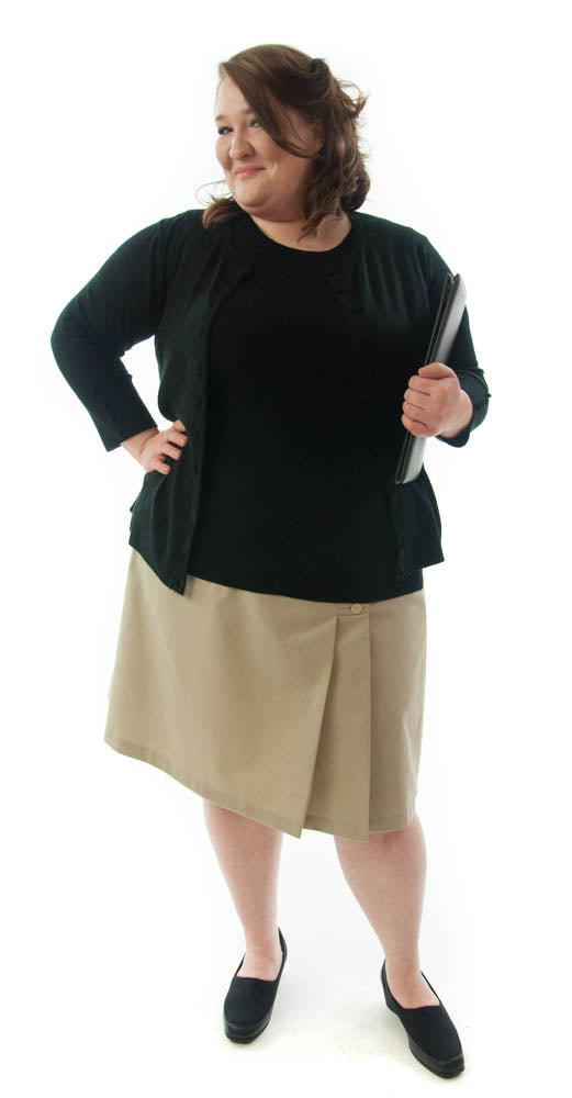 The School Uniform Skirt for Women's Plus Sizes by Dressing For His Glory has two off centered pleats in the front and back. It has a single button front closure with a small pocket. The skirt has a contour waistband and is comfortable, extremely durable, stain resistant, and great looking the entire school year! 