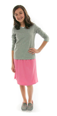 Jack and Jill Skort for Girl Sizes by Dressing For His Glory The Jack and Jill Skort for Girls Plus Size is a straight cut skirt with loose fitting shorts underneath and  are attached at the waist. It has slits on each side seams for easy leg movement and has an elastic waistband. The shorts are made of the same fabric and are 1