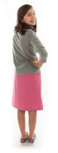 Jack and Jill Skort for Girl Sizes by Dressing For His Glory The Jack and Jill Skort for Girls Plus Size is a straight cut skirt with loose fitting shorts underneath and  are attached at the waist. It has slits on each side seams for easy leg movement and has an elastic waistband. The shorts are made of the same fabric and are 1" shorter than the outer layer skirt.