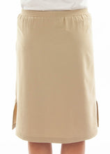 Load image into Gallery viewer, Back view: The Straight Skort for Junior Sizes by Dressing For His Glory is a straight cut skirt with loose fitting shorts underneath and are attached at the waist. It has slits on each side seam for easy leg movement and an elastic waistband. The shorts are made of the same fabric and are 1&quot; shorter than the outer layer skirt.