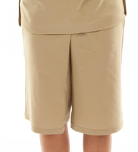 Load image into Gallery viewer, The Straight Skort for Junior Sizes by Dressing For His Glory is a straight cut skirt with loose fitting shorts underneath and are attached at the waist. It has slits on each side seam for easy leg movement and an elastic waistband. The shorts are made of the same fabric and are 1&quot; shorter than the outer layer skirt.