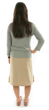Load image into Gallery viewer, The Straight Skort for Junior Sizes by Dressing For His Glory is a straight cut skirt with loose fitting shorts underneath and are attached at the waist. It has slits on each side seam for easy leg movement and an elastic waistband. The shorts are made of the same fabric and are 1&quot; shorter than the outer layer skirt.