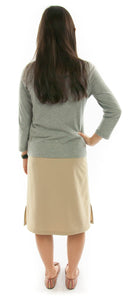 The Straight Skort for Junior Sizes by Dressing For His Glory is a straight cut skirt with loose fitting shorts underneath and are attached at the waist. It has slits on each side seam for easy leg movement and an elastic waistband. The shorts are made of the same fabric and are 1" shorter than the outer layer skirt.
