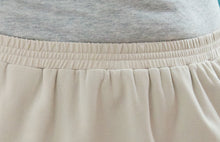 Load image into Gallery viewer, Elastic waistband detail: The Straight Skort for Ladies Sizes by Dressing For His Glory is a straight cut skirt with loose fitting shorts underneath and are attached at the waist. The skort has slits on each side seam for easy leg movement, an elastic waistband and optional side seam slit pockets. 